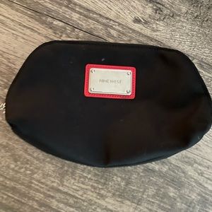 Gently used Nine West makeup bag.
